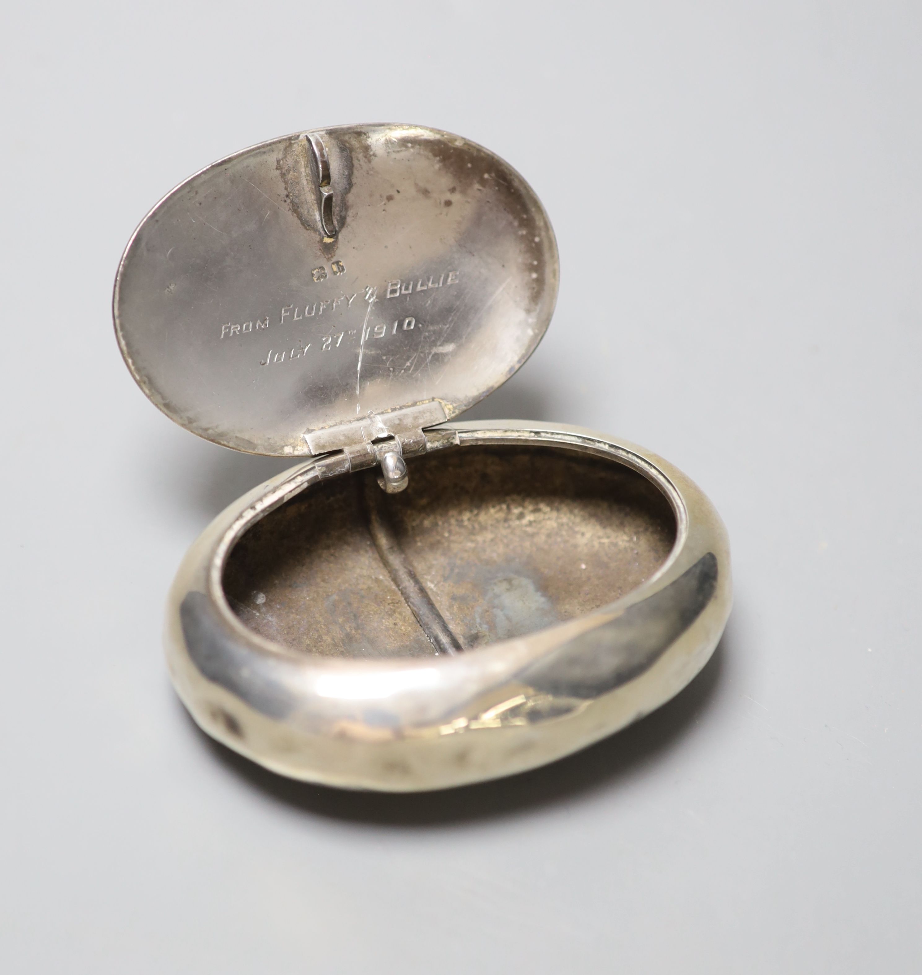 A George V silver oval tobacco box, Marion & Co Ltd, Birmingham, 1907, 9cm.